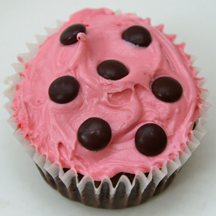 pink cupcake with brown dots