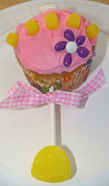 Baby rattle cupcake